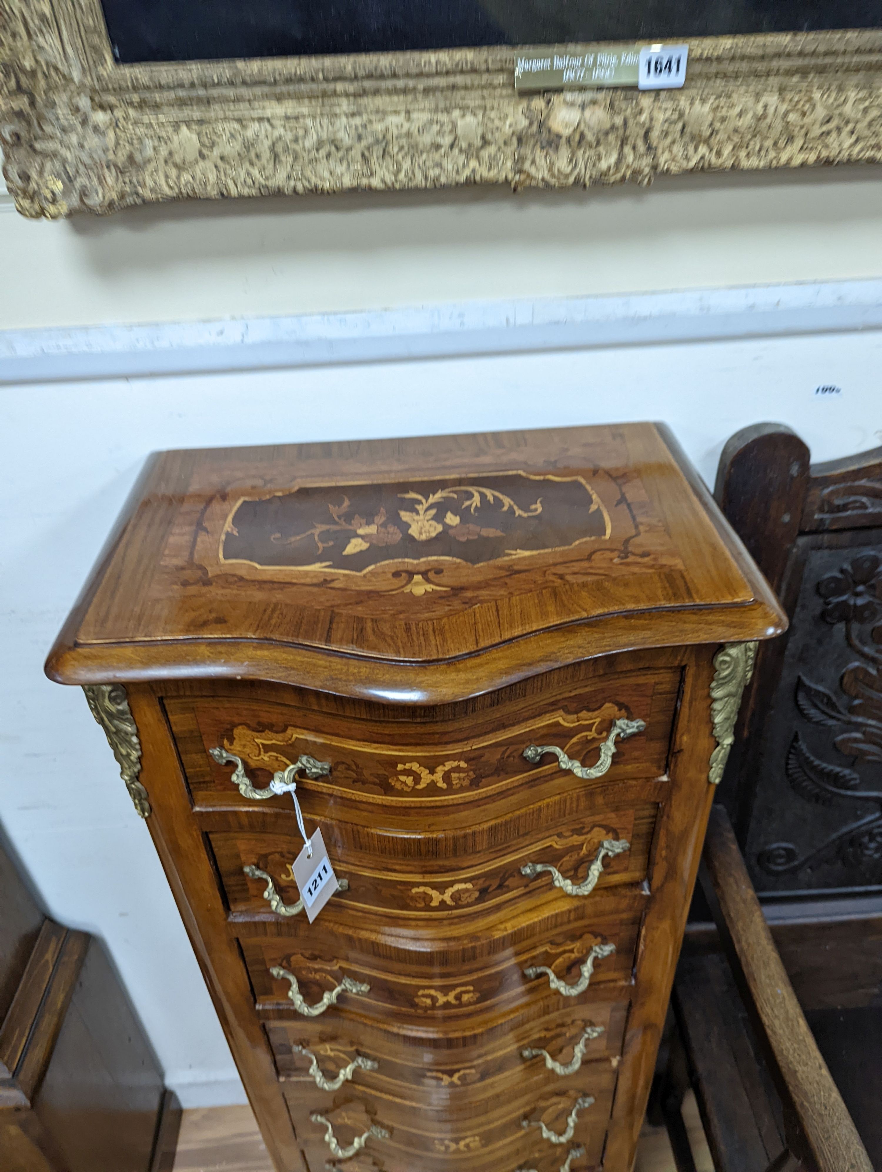 A Louis XV style marquetry inlaid serpentine fronted semanier, fitted seven small drawers, width 47cm, height 122cm